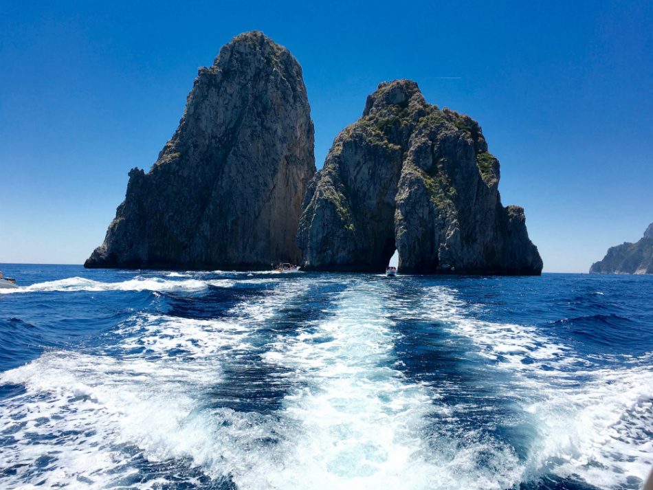 Day trips near the Amalfi Coast - Fariglioni of Capri - by Isaac Myers
